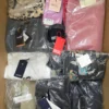 The photo shows a package with clothing in the category AP.