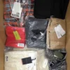 The photo shows a package with clothing in the category AP.