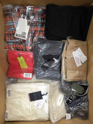 The photo shows a package with clothing in the category AP.
