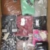 The photo shows a package with clothing in the category AP.