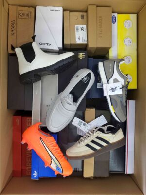 The photo shows a package with footwear in the category AS.