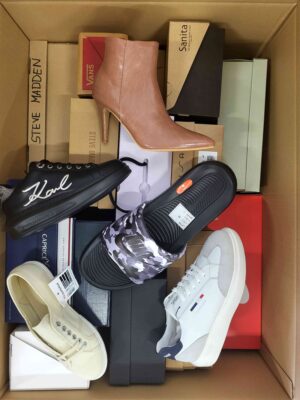 The photo shows a package with footwear in the category AS.