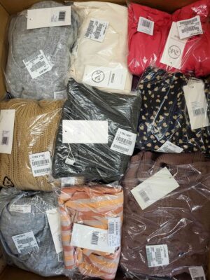 The photo shows a package with clothing in the category YA.