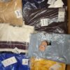 The photo shows a package with clothing in the category YA.