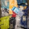 The photo shows a package with clothing in the category H.