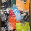 The photo shows a package with clothing in the category H.