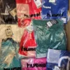 The photo shows a package with clothing in the category H.