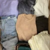 The photo shows a package with clothing in the category BSN.