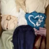 The photo shows a package with clothing in the category BSN.