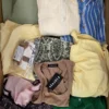 The photo shows a package with clothing in the category BSN.