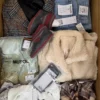 The photo shows a package with clothing in the category BSN.