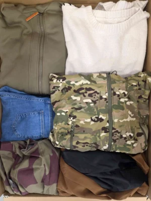 The photo shows a package with clothing in the category BSN.