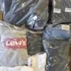 D1420 2 The photo shows a package with clothing in the category D.