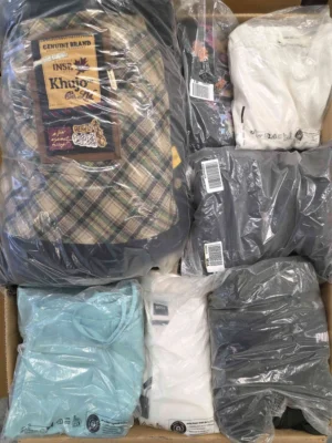 The photo shows a package with clothing in the category D.