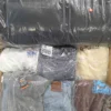 The photo shows a package with clothing in the category D.