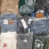 The photo shows a package with clothing in the category D.