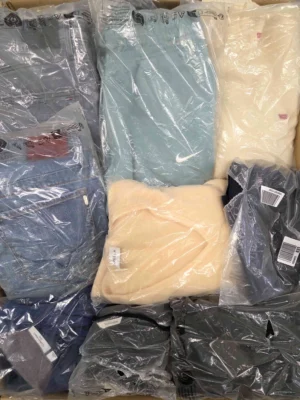 The photo shows a package with clothing in the category D.