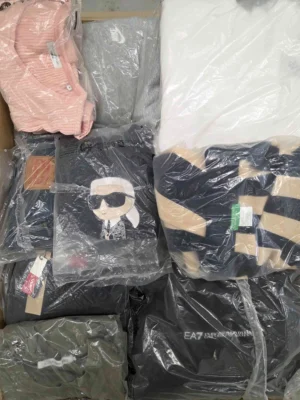 The photo shows a package with clothing in the category D.
