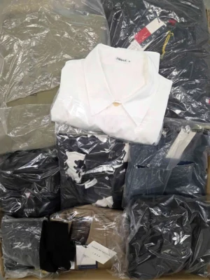 The photo shows a package with clothing in the category D.