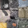 The photo shows a package with clothing in the category D.