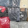 The photo shows a package with clothing in the category D.