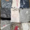 The photo shows a package with clothing in the category D.
