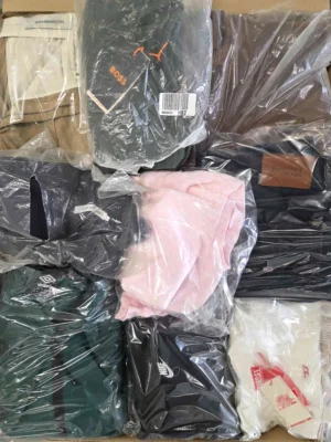 The photo shows a package with clothing in the category D.
