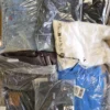 The photo shows a package with clothing in the category D.