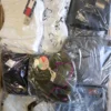 The photo shows a package with clothing in the category D.