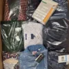 The photo shows a package with clothing in the category B.