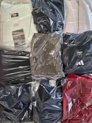 The photo shows a package with clothing in the category B.