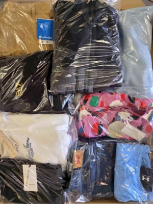 The photo shows a package with clothing in the category B.