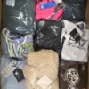 The photo shows a package with clothing in the category B.