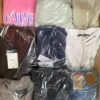 The photo shows a package with clothing in the category B.