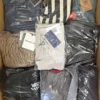 The photo shows a package with clothing in the category B.
