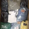 The photo shows a package with clothing in the category B.