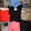 The photo shows a package with clothing in the category U.