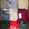 The photo shows a package with clothing in the category U.