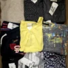 The photo shows a package with clothing in the category U.