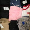 The photo shows a package with clothing in the category U.
