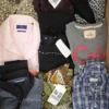 The photo shows a package with clothing in the category U.