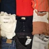 The photo shows a package with clothing in the category U.