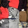 The photo shows a package with clothing in the category U.
