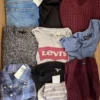 The photo shows a package with clothing in the category U.