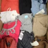 The photo shows a package with clothing in the category U.