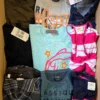 The photo shows a package with clothing in the category U.