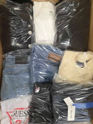 The photo shows a package with clothing in the category C.