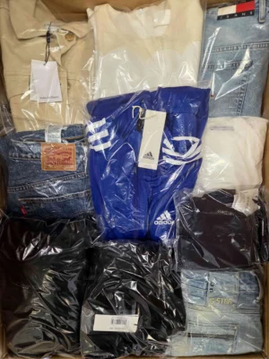 The photo shows a package with clothing in the category C.
