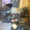 The photo shows a package with clothing in the category C.