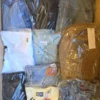 The photo shows a package with clothing in the category C.